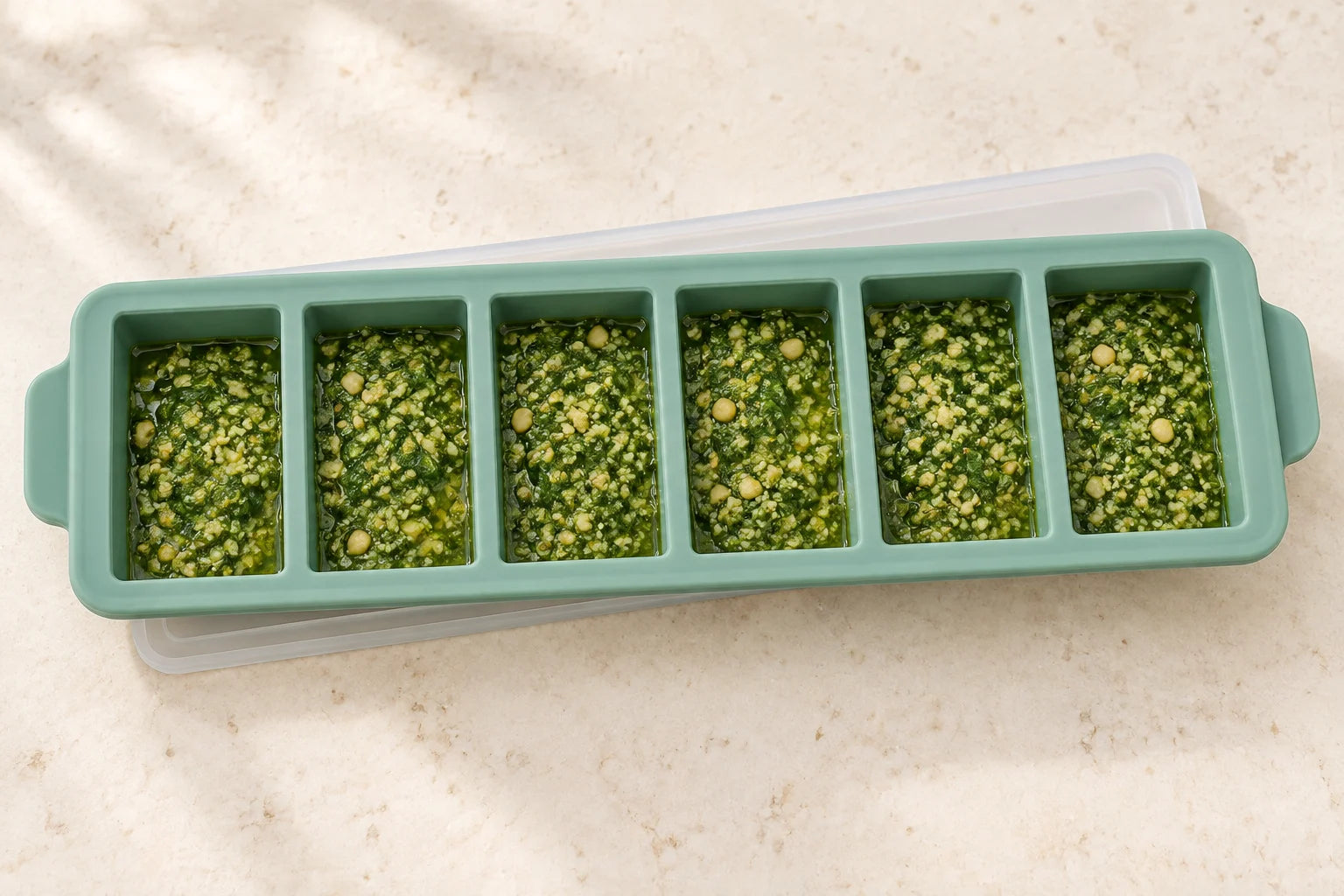 Basil pesto for pasta night portioned in a Eucalyptus tray with 6 compartments